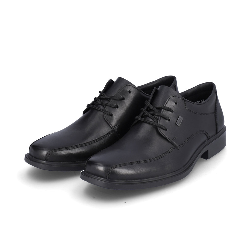 muške crne cipele odijelo