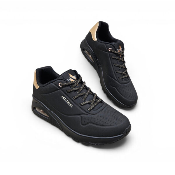 Skechers Uno-Shimmer BBK tenisice s Air-Cooled Memory Foam uloškom u crnoj boji sa zlatnim detaljima
